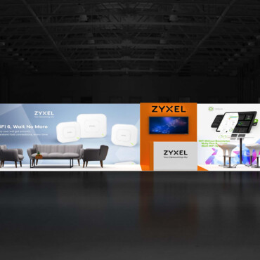 Zyxel booth with an orange display tower, large product graphics and a lounge seating area.